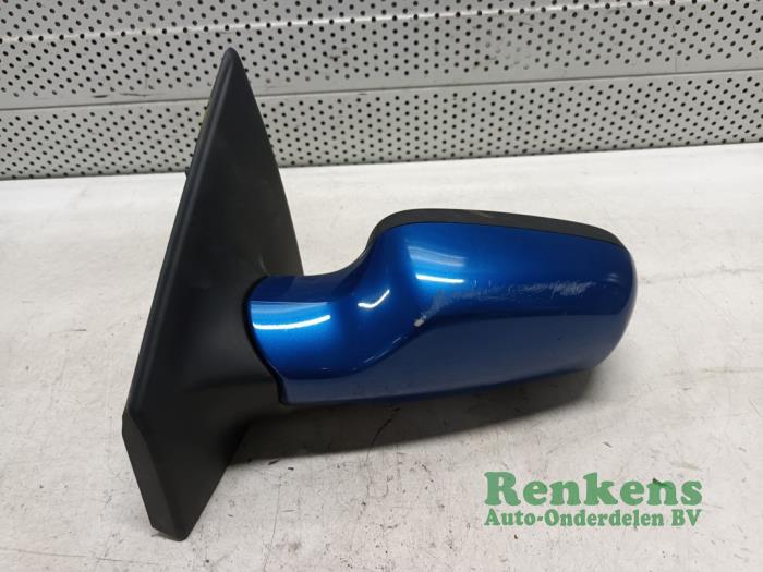 Wing mirror, left from a Renault Clio III (BR/CR) 1.6 16V 2007