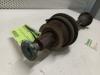 Front drive shaft, left from a Seat Ibiza ST (6J8) 1.4 16V 2010
