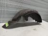 Wheel arch liner from a Ford Fiesta 6 (JA8) 1.6 TDCi 16V ECOnetic 2012
