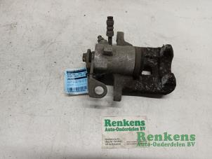 Used Rear brake calliper, left Skoda Fabia III (NJ3) 1.2 TSI 16V Price € 40,00 Margin scheme offered by Renkens Auto-Onderdelen B.V.