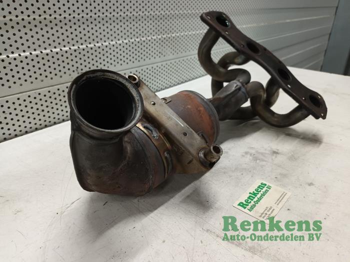 Exhaust manifold + catalyst from a Citroën C4 Picasso (UD/UE/UF) 1.6 16V VTi 120 2009