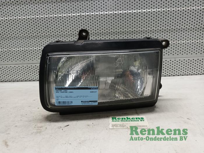Headlight, left from a Opel Frontera (6B) 2.2 DTI 16V 2000