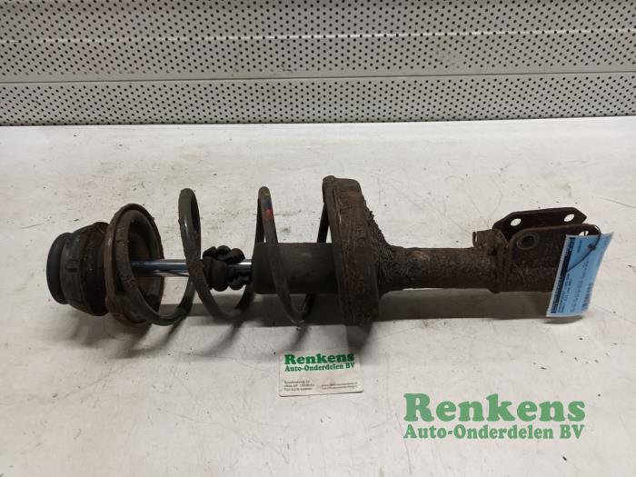 Front shock absorber rod, left from a Renault Clio II (BB/CB) 1.4 16V 2001