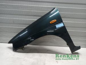 Used Front wing, left Mazda Demio (DW) 1.3 16V Price on request offered by Renkens Auto-Onderdelen B.V.
