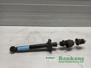 Used Rear shock absorber, left Mazda Demio (DW) 1.3 16V Price € 30,00 Margin scheme offered by Renkens Auto-Onderdelen B.V.