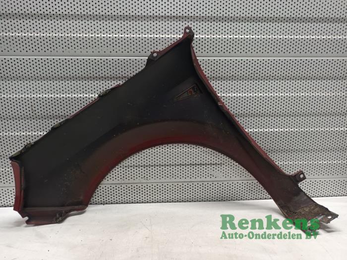 Front wing, right from a Renault Scénic II (JM) 2.0 16V 2005