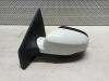 Wing mirror, left from a Renault Clio III (BR/CR) 1.5 dCi FAP 2012