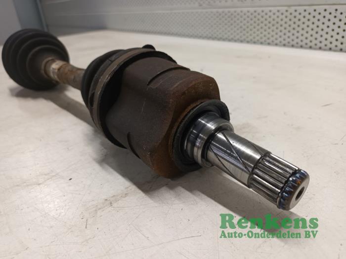 Front drive shaft, left from a Opel Combo (Corsa C) 1.3 CDTI 16V 2011