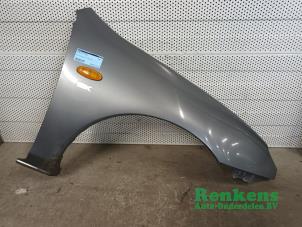 Used Front wing, right Mazda 323 C (BA13) 1.5i 16V Price on request offered by Renkens Auto-Onderdelen B.V.