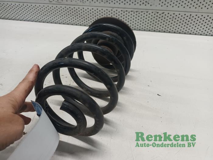 Rear coil spring from a Opel Zafira (M75) 2.0 16V Turbo OPC 2010