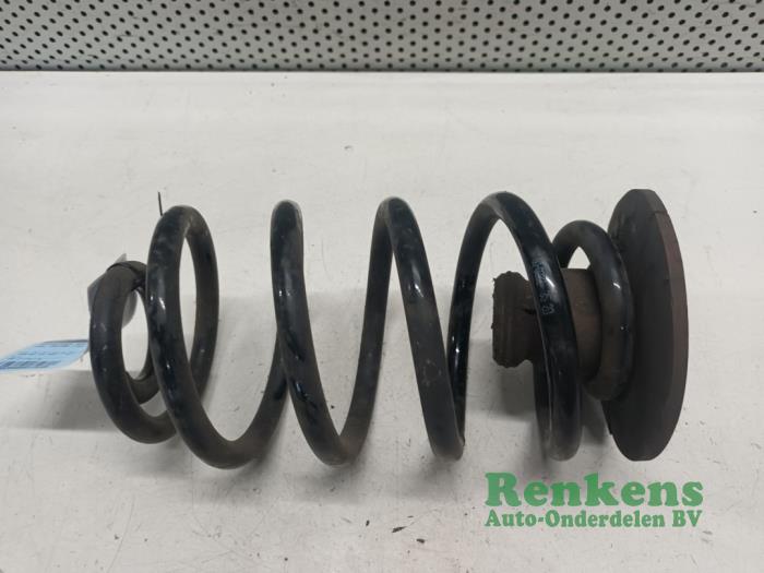 Rear coil spring from a Opel Zafira (M75) 2.0 16V Turbo OPC 2010