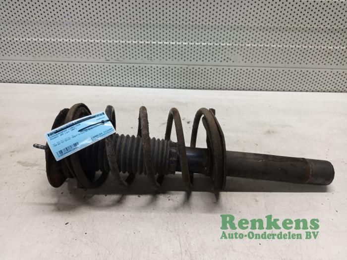 Front shock absorber rod, left from a Peugeot 205 II (20A/C) 1.4 1997