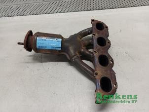 Used Exhaust manifold + catalyst Volkswagen Polo V (6R) 1.4 16V Price on request offered by Renkens Auto-Onderdelen B.V.