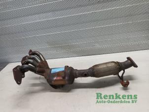 Used Exhaust manifold + catalyst Ford Focus 2 Wagon 1.8 16V Price on request offered by Renkens Auto-Onderdelen B.V.