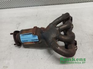 Used Exhaust manifold + catalyst Seat Ibiza IV (6J5) 1.4 16V Price on request offered by Renkens Auto-Onderdelen B.V.