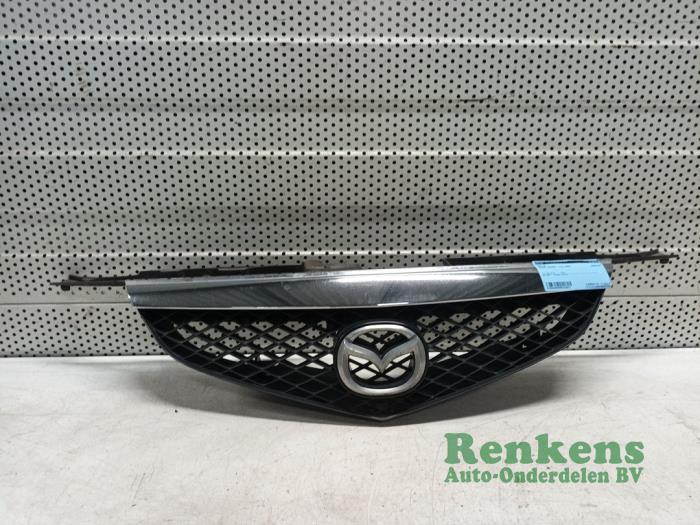Używane Grill Mazda Premacy 1.8 16V Cena € 30,00 Procedura marży oferowane przez Renkens Auto-Onderdelen B.V.