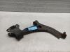Front wishbone, right from a Ford Focus 3 Wagon 1.0 Ti-VCT EcoBoost 12V 125 2015