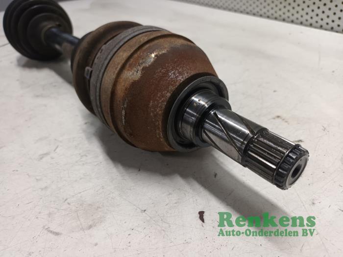 Front drive shaft, left from a Opel Astra H Twin Top (L67) 1.8 16V 2006