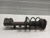 Front shock absorber rod, left from a Toyota Avensis Wagon (T25/B1E), 2003 / 2008 1.8 16V VVT-i, Combi/o, Petrol, 1.794cc, 95kW (129pk), FWD, 1ZZFE, 2003-04 / 2008-11, ZZT251 2006