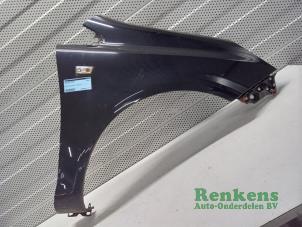 Used Front wing, right Opel Corsa D 1.2 16V Price € 70,00 Margin scheme offered by Renkens Auto-Onderdelen B.V.