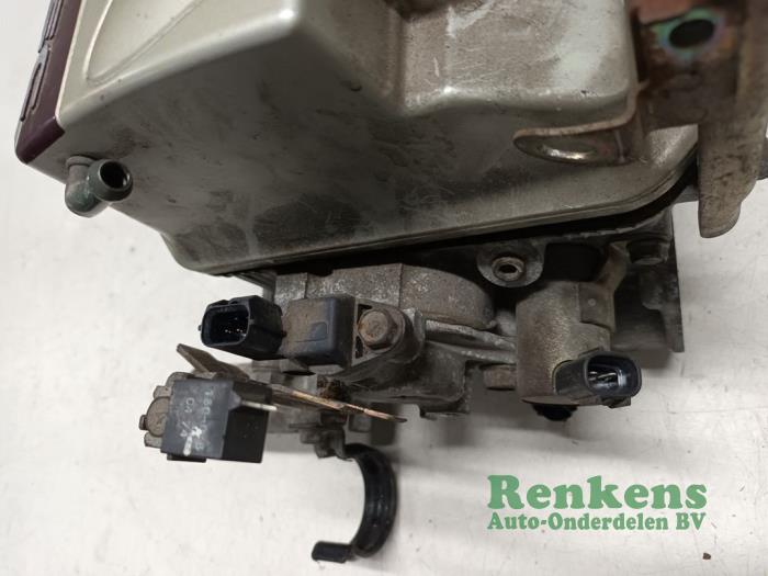 Cylinder head Mitsubishi Grandis 2.4 16V MIVEC - 4G69