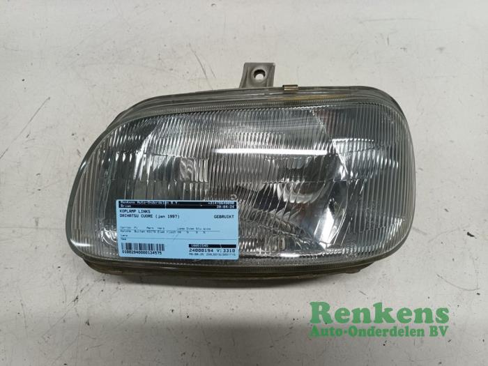 Headlight, left from a Daihatsu Cuore (L501) 850,Domino 1997