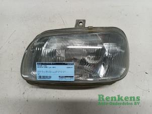 Used Headlight, left Daihatsu Cuore (L501) 850,Domino Price € 35,00 Margin scheme offered by Renkens Auto-Onderdelen B.V.