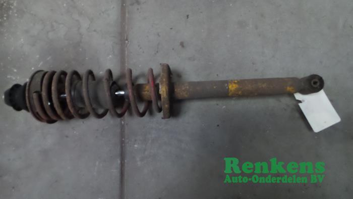 Rear shock absorber rod, left from a Seat Ibiza 1996