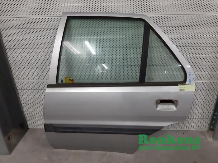 Rear door 4-door, left from a Citroën Saxo 1.1i X,SX 1997
