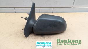 Usagé Rétroviseur gauche Renault R19 Prix € 20,00 Règlement à la marge proposé par Renkens Auto-Onderdelen B.V.