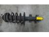 Front shock absorber rod, left from a Volkswagen Transporter T5, 2003 / 2015 1.9 TDi, Minibus, Diesel, 1.896cc, 63kW (86pk), FWD, AXC, 2003-04 / 2009-11, 7HB; 7HJ 2005
