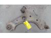 Front wishbone, right from a Opel Corsa D 1.4 16V Twinport 2008