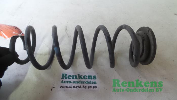 Rear coil spring from a Volkswagen Scirocco (137/13AD) 2.0 TDI 16V 2010