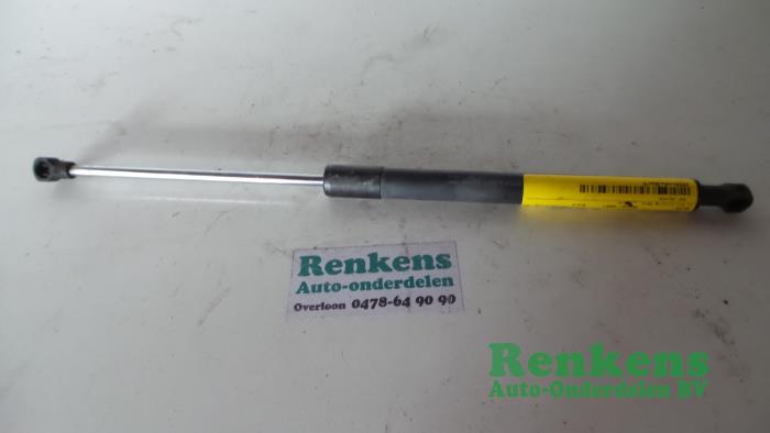 Rear gas strut, left from a Renault Clio III (BR/CR) 1.2 16V 65 2007