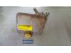 Expansion vessel from a Ford Focus 1 Wagon 1.8 TDCi 100 2003