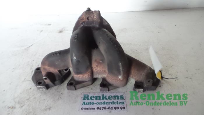 Exhaust manifold from a Opel Corsa B (73/78/79) 1.2i 16V 1998