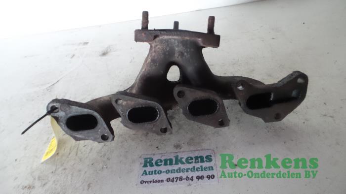 Exhaust manifold from a Opel Corsa B (73/78/79) 1.2i 16V 1998