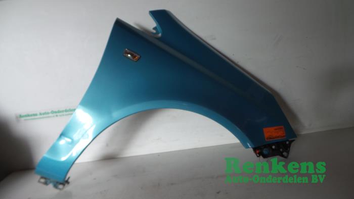 Front wing, right from a Opel Corsa D 1.2 16V 2011