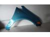 Front wing, right from a Opel Corsa D 1.2 16V 2011