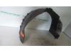 Wheel arch liner from a Opel Vectra C 1.8 16V 2003