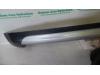 Rear bumper strip, central from a Volkswagen Polo 2008