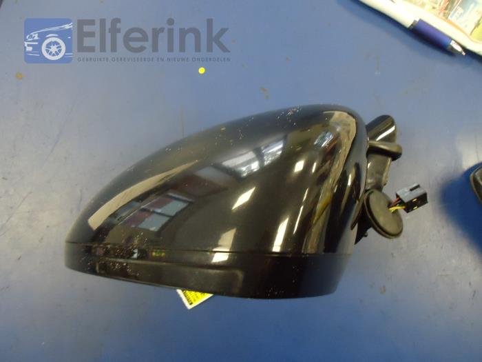 Wing mirror, left from a Opel Corsa D 1.4 16V Twinport 2008