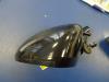 Wing mirror, left from a Opel Corsa D 1.4 16V Twinport 2008