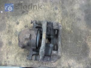 Used Front brake calliper, left Saab 900 I 2.1 i 16V Price € 50,00 Margin scheme offered by Auto Demontage Elferink B.V.