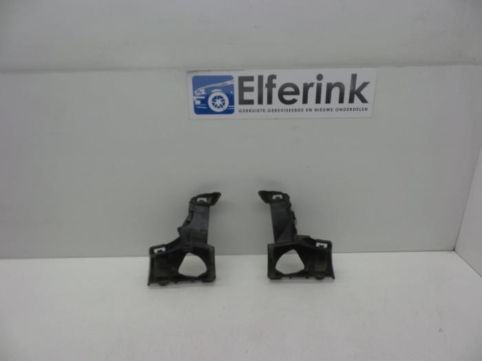 Headlight washer nozzle holder