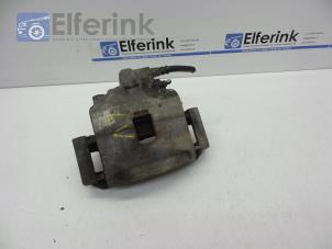 Used Front brake calliper, left Opel Corsa E 1.4 16V Price € 40,00 Margin scheme offered by Auto Demontage Elferink B.V.