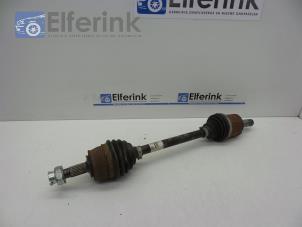 Used Front drive shaft, left Opel Corsa E 1.4 16V Price € 40,00 Margin scheme offered by Auto Demontage Elferink B.V.