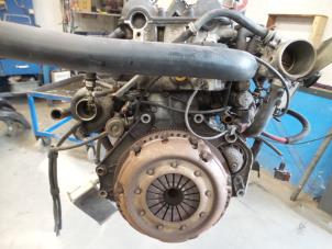 Motor van een Saab 9000 CS 2.0i 16V LPT 1997
