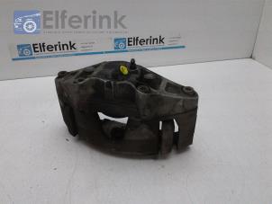 Used Front brake calliper, left Volvo V40 Cross Country (MZ) 1.5 T3 16V Geartronic Price € 65,00 Margin scheme offered by Auto Demontage Elferink B.V.