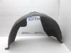 Wheel arch liner from a Saab 9-5 (YS3E) 2.2 TiD 16V 2005